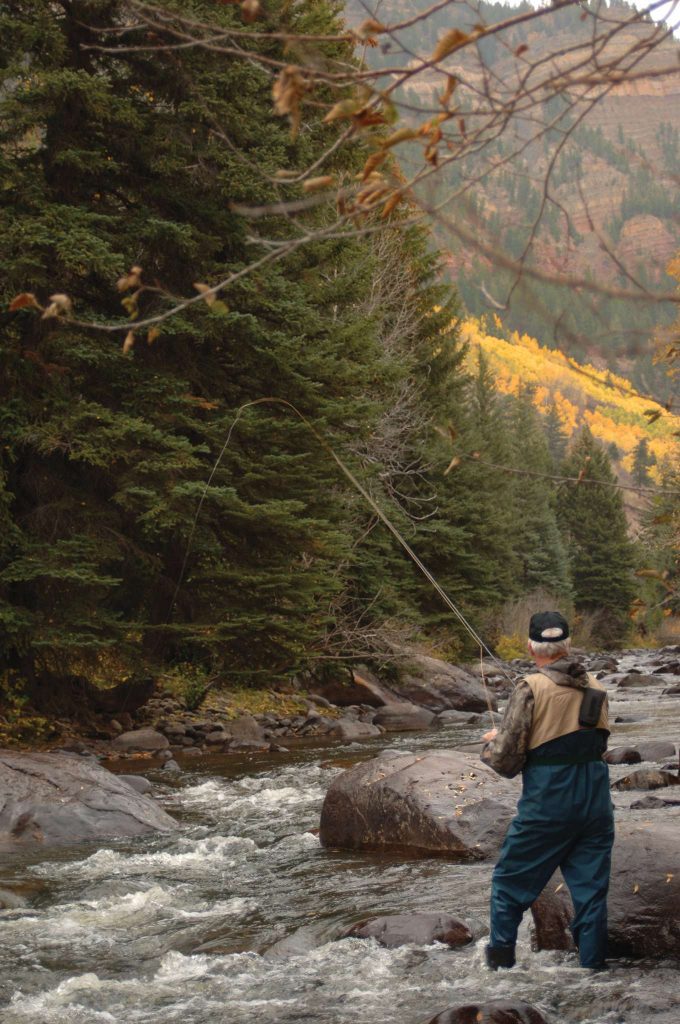 man fly fishing in the smoky mountains