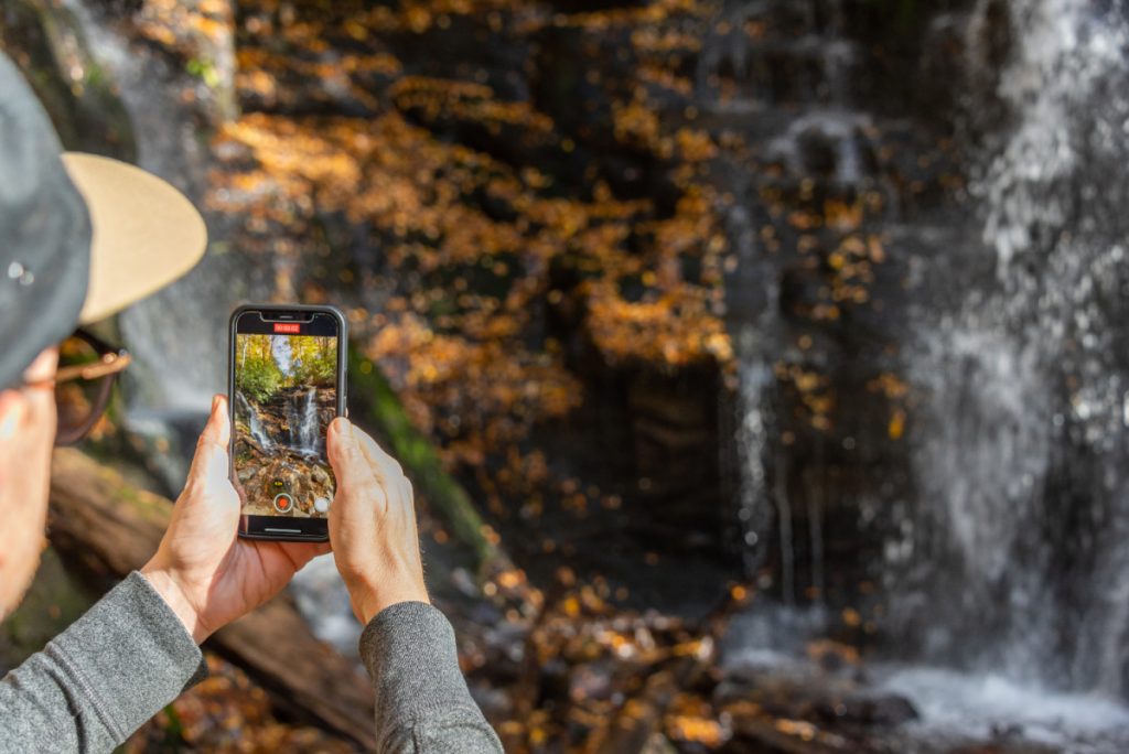 man taking video of soco falls
