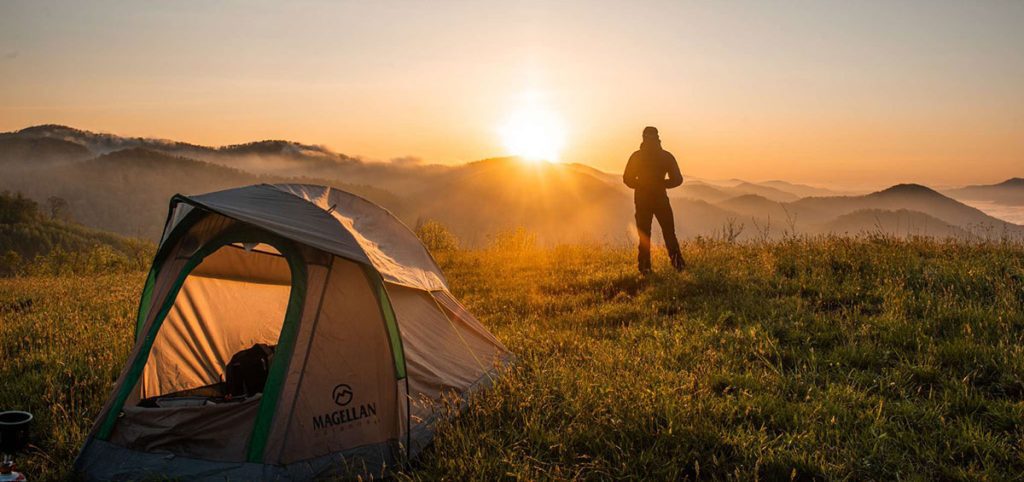 Camper watching the sunrise in the Great Smoky Mountains of North Carolina